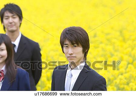 Businessman and Students Standing in Rape Field, Portrait, High Angle View, Head and Shoulder, Differential Focus View Large Photo Image Stock Photo - Businessman and Students Standing in Rape Field, Portrait, High Angle View, Head and Shoulder, Differential Focus. Fotosearch