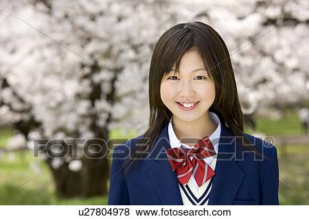 Stock Photo - High School Girl Drinking Soda. Fotosearch