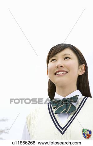 High School Girl Looking Up View Large Photo Image Stock Photo - High School Girl Looking Up. Fotosearch