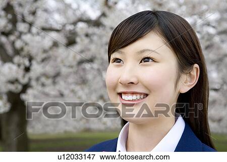 High School Student Girl Under Cherry Blossoms, Differential Focus View Large Photo Image Stock Photo - High School Student Girl Under Cherry Blossoms, Differential Focus. Fotosearch
