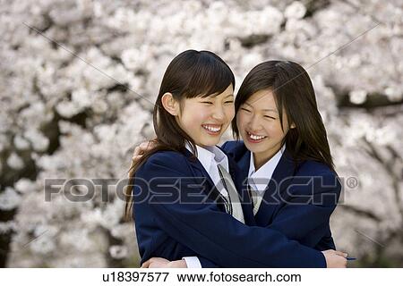 High School Students Hugging Together in School Yard View Large Photo Image Stock Photo - High School Students Hugging Together in School Yard. Fotosearch
