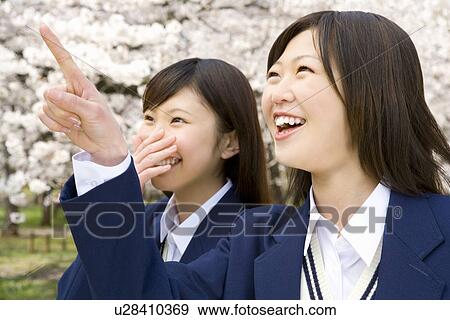 Stock Photo - High School Students Hugging Together. Fotosearch