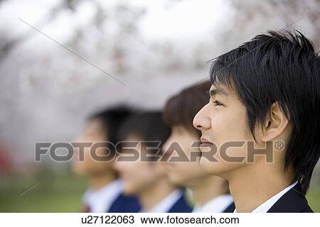 Stock Image - High School Students in a Row, Differential Focus. Fotosearch