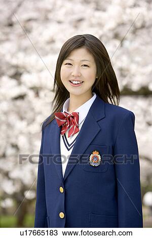 Stock Image - High School Students Standing In a Row in School Yard. Fotosearch