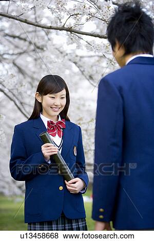 High School Students Under Cherry Blossoms with Holding Diploma View Large Photo Image Stock Photo - High School Students Under Cherry Blossoms with Holding Diploma. Fotosearch