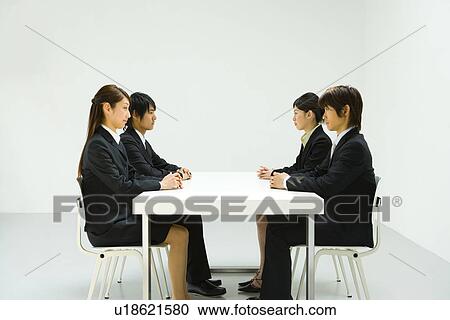 Stock Image - Business Meeting, Side View. Fotosearch