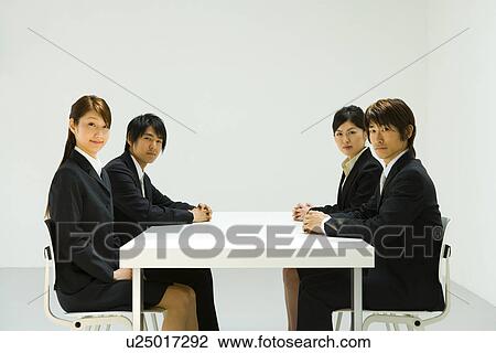 Stock Image - Business Meeting, Side View. Fotosearch