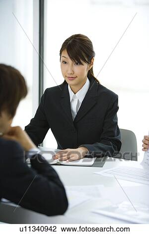 Businessman And Businesswoman In Meeting, Head and Shoulder, Front View, Rear View, View Large Photo Image Stock Image - Businessman And Businesswoman In Meeting, Head and Shoulder, Front View, Rear View, . Fotosearch