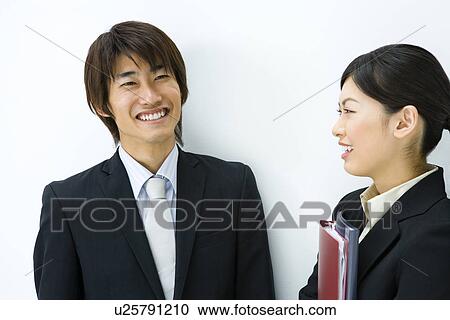 Businessman And Businesswoman Taking, Front View, Side View, Head and Shoulder View Large Photo Image Stock Image - Businessman And Businesswoman Taking, Front View, Side View, Head and Shoulder. Fotosearch