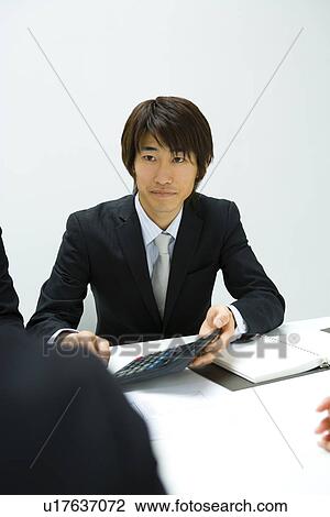 Businessman In Meeting, Front View View Large Photo Image Stock Image - Businessman In Meeting, Front View. Fotosearch
