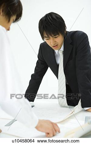 Businessmen In Meeting, Side View, Front View View Large Photo Image Picture - Businessmen In Meeting, Side View, Front View. Fotosearch