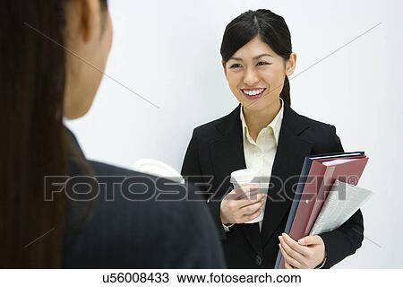 Stock Image - Businesswoman Talking, Front View, Rear View, Head and Shoulder. Fotosearch