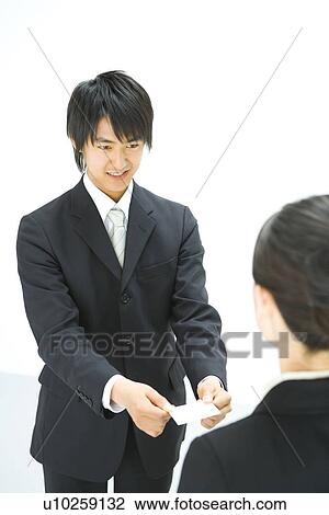 Exchanging Business Cards, Smiling, Three Quarter Length, Front View, Rear View, High Angle View View Large Photo Image Stock Image - Exchanging Business Cards, Smiling, Three Quarter Length, Front View, Rear View, High Angle View. Fotosearch