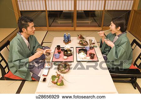 Japanese couple in Yukata having dinner, high angle view, side view, Japan View Large Photo Image Stock Photo - Japanese couple in Yukata having dinner, high angle view, side view, Japan. Fotosearch