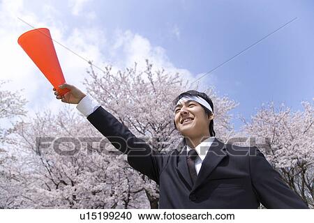 Businessman Holding a Megaphone Up, Low Angle View, Head and Shoulder View Large Photo Image Stock Image - Businessman Holding a Megaphone Up, Low Angle View, Head and Shoulder. Fotosearch