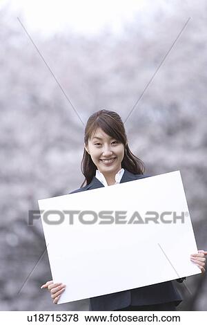Businesswoman Holding a White Board, Head and Shoulder, Front View, Differential Focus View Large Photo Image Stock Photo - Businesswoman Holding a White Board, Head and Shoulder, Front View, Differential Focus. Fotosearch