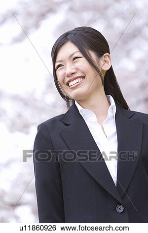 Businesswoman Standing, Smiling, Waist Up, Front View, Portrait, Differential Focus View Large Photo Image Stock Photograph - Businesswoman Standing, Smiling, Waist Up, Front View, Portrait, Differential Focus. Fotosearch