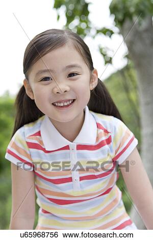 Stock Photograph - Portrait of girl. Fotosearch