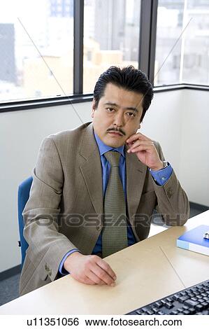 Stock Photograph - Portrait of businessman. Fotosearch