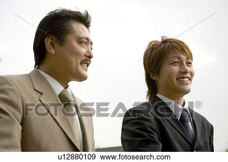 Stock Photo - Portrait of two businessmen. Fotosearch
