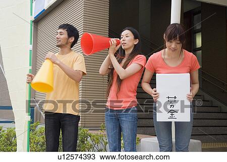 Young people asking donation View Large Photo Image Stock Image - Young people asking donation. Fotosearch