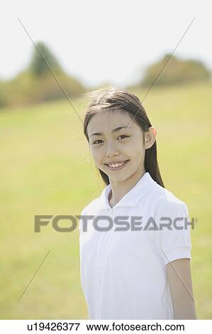 Portrait of schoolgirl wearing gym clothes View Large Photo Image Stock Photo - Portrait of schoolgirl wearing gym clothes. Fotosearch