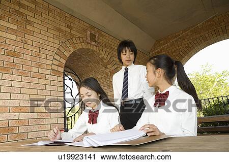 School children studying View Large Photo Image Stock Image - School children studying. Fotosearch