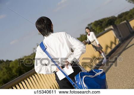 Schoolboy holding love letter View Large Photo Image Stock Image - Schoolboy holding love letter. Fotosearch