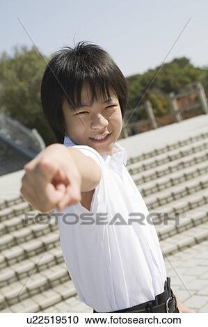 Schoolboy pointing View Large Photo Image Stock Image - Schoolboy pointing. Fotosearch
