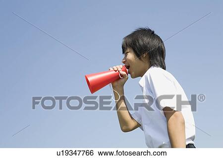 Schoolboy shouting with megaphone View Large Photo Image Stock Photograph - Schoolboy shouting with megaphone. Fotosearch