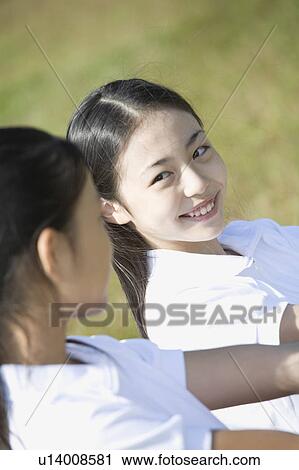 Two schoolgirls wearing gym clothes View Large Photo Image Stock Image - Two schoolgirls wearing gym clothes. Fotosearch
