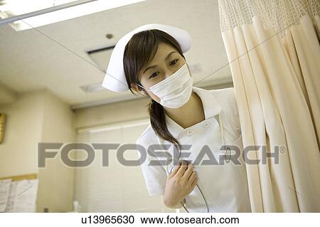 Portrait of female nurse View Large Photo Image Stock Image - Portrait of female nurse. Fotosearch