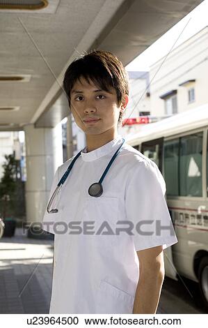 Stock Image - Portrait of male nurse. Fotosearch