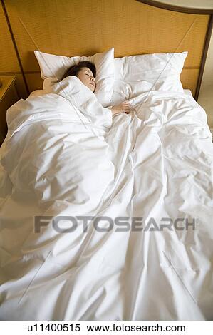 Mature woman sleeping in bed View Large Photo Image Stock Photography - Mature woman sleeping in bed. Fotosearch