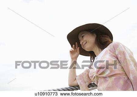 Mature woman with hat View Large Photo Image Stock Image - Mature woman with hat. Fotosearch