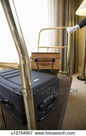 Suitcases on luggage cart View Large Photo Image Stock Photo - Suitcases on luggage cart. Fotosearch