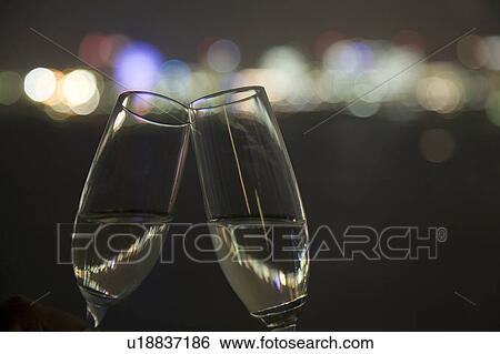 Stock Photograph - Two champagne glasses. Fotosearch