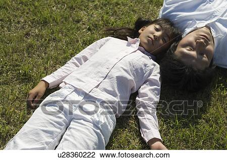 Father and daughter sleeping View Large Photo Image Stock Image - Father and daughter sleeping. Fotosearch