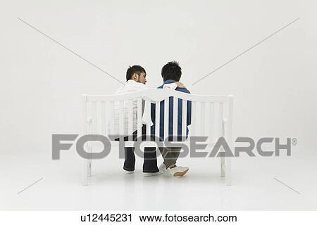 Young man comforting his friend View Large Photo Image Stock Image - Young man comforting his friend. Fotosearch