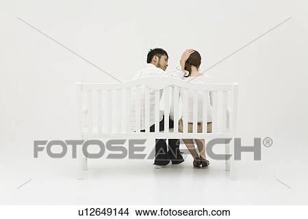 Young man comforting his girlfriend View Large Photo Image Picture - Young man comforting his girlfriend. Fotosearch