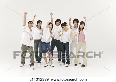 Stock Photo - Young people raising hands. Fotosearch