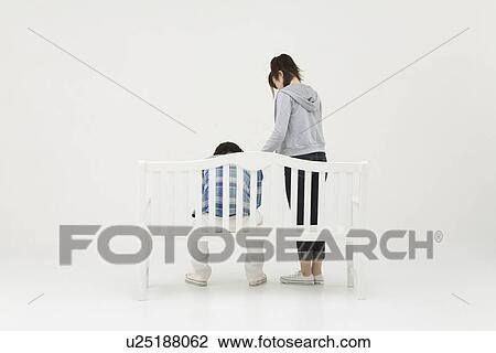 Young woman comforting her boyfriend View Large Photo Image Stock Image - Young woman comforting her boyfriend. Fotosearch