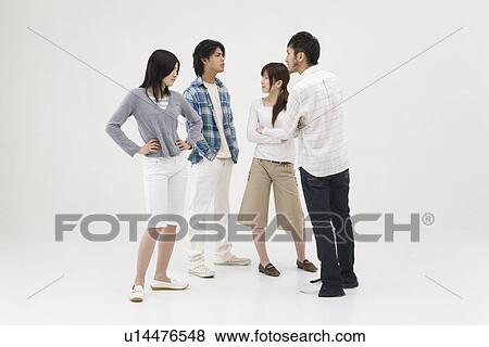 Stock Photo - Four people arguing. Fotosearch
