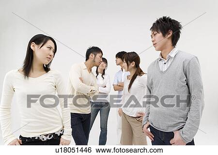 Group of people glaring at each other View Large Photo Image Stock Photograph - Group of people glaring at each other. Fotosearch
