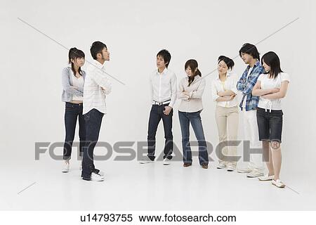 Group of people glaring at each other View Large Photo Image Stock Photography - Group of people glaring at each other. Fotosearch