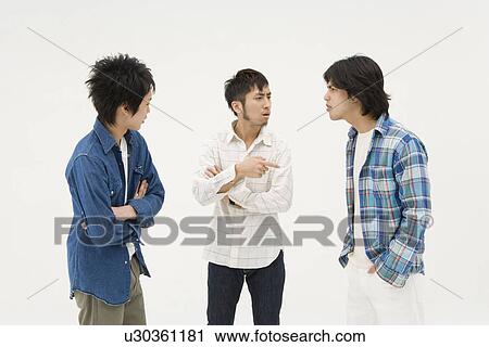 Stock Image - Three young men arguing. Fotosearch