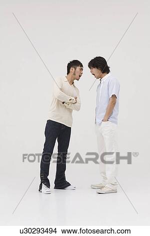 Two young men arguing View Large Photo Image Picture - Two young men arguing. Fotosearch