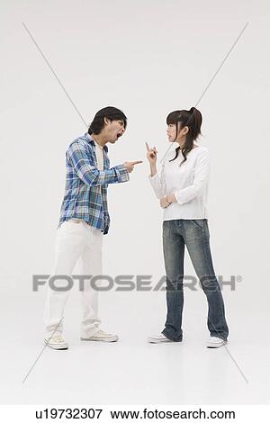 Young couple arguing View Large Photo Image Stock Photo - Young couple arguing. Fotosearch
