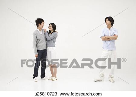 Young man and couple View Large Photo Image Stock Image - Young man and couple. Fotosearch