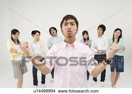 Young man standing confident View Large Photo Image Picture - Young man standing confident. Fotosearch